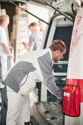 <p>After one construction site, there's another! Painter and decorator trainee Patrick Weigand prepares the company car for the next assignment</p>