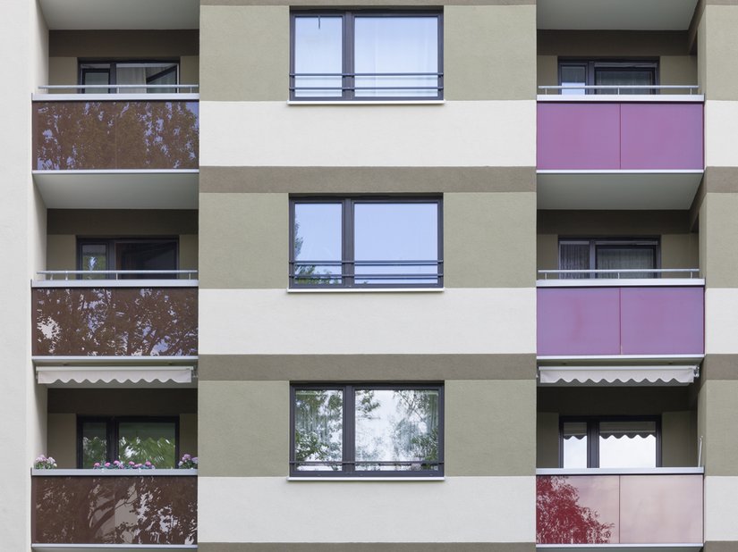 The consistent lines between the floors and the balcony rows gives the building structures a personality.