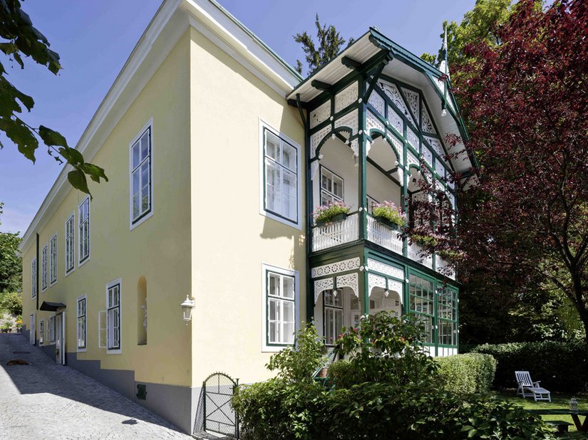 The villa’s elaborately carved wooden veranda, in the Biedermeier style, has undergone full renovation.