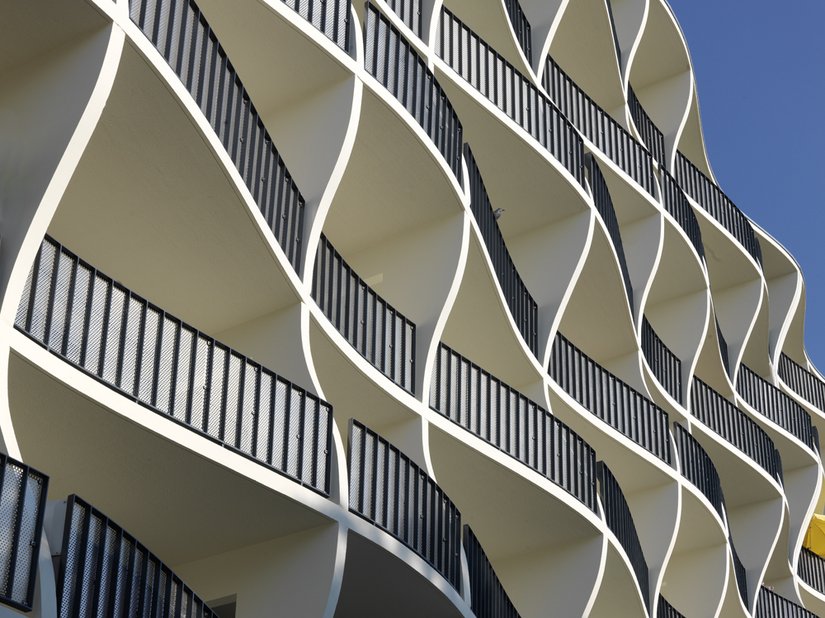With the wave movement, the architects created a dynamic and vibrant facade.