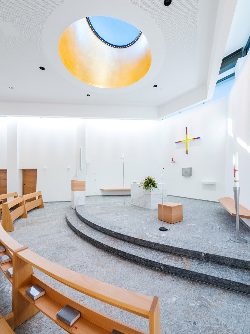 The altar and choir area are elevated by two steps.