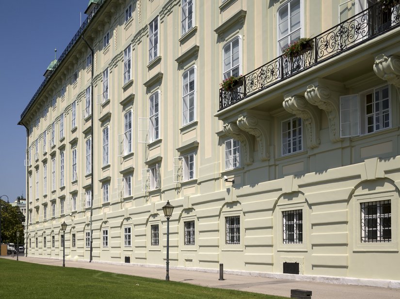 The courtyard shines in a bright yellow.