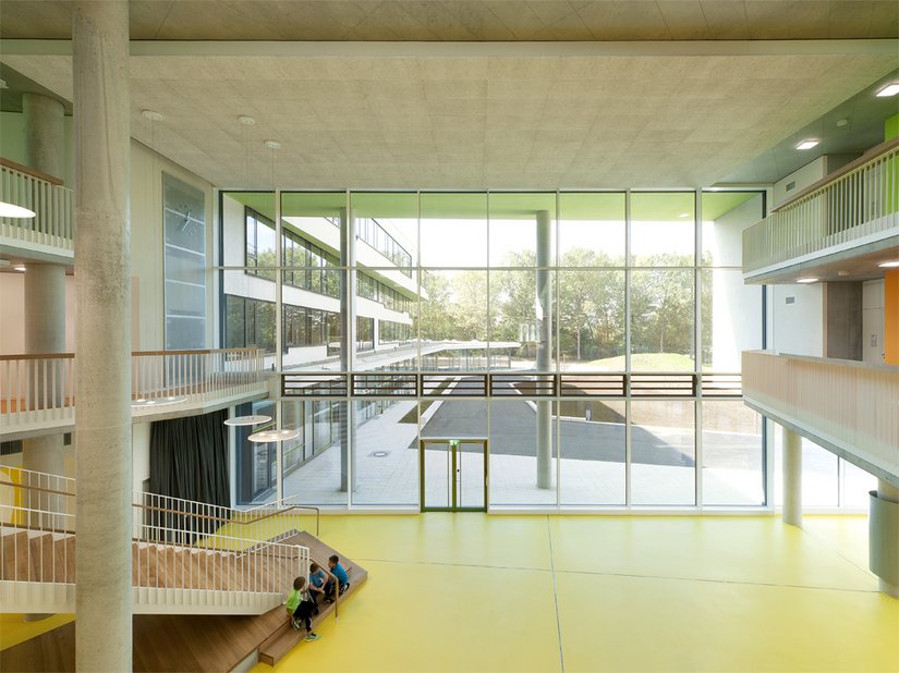 <p>In the hall, people are welcomed by a bright yellow linoleum floor that lifts the spirits all by itself.</p>