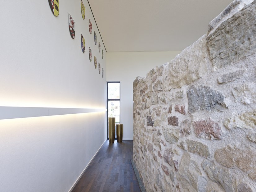 The old monastery wall was integrated and runs straight through the hotel on the first floor.