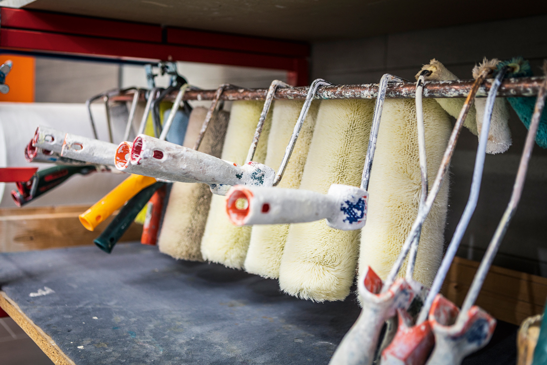 A range of paint rollers all in a row